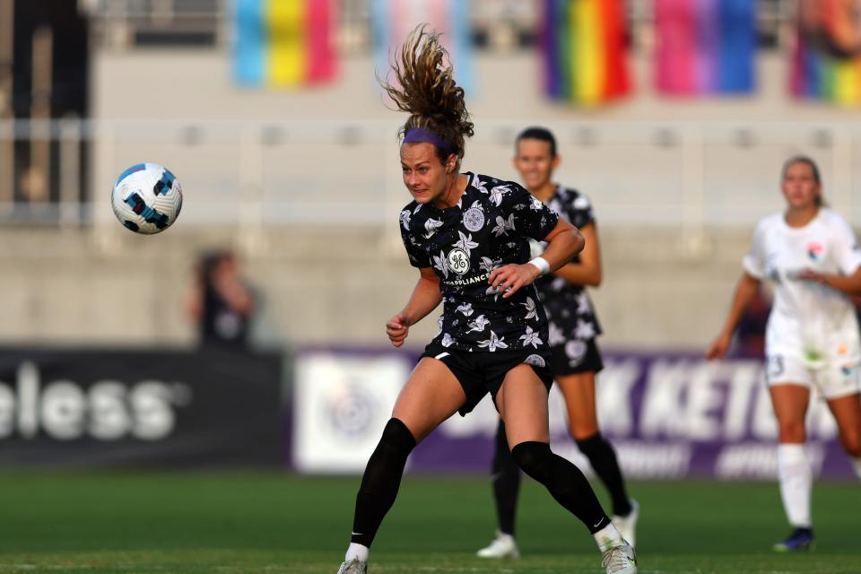 May 18, 2022; Louisville, Kentucky, USA; Racing Louisville FC player Jaelin Howell (6) heads the ball during the first half San Diego Wave FC at Lynn Family Stadium. Mandatory Credit: EM Dash-USA TODAY Sports