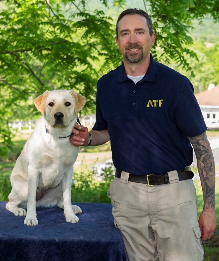 Babs and her handler, Zane Dodds, a 25-year veteran with the Florida Department of Law Enforcement.