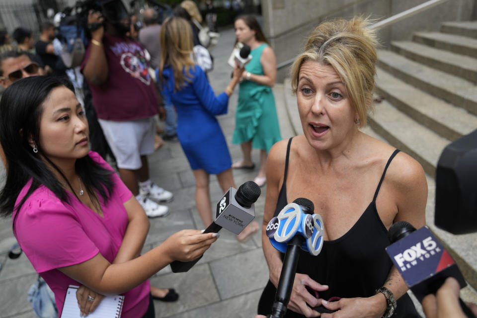 Sexual assault survivor Laurie Kanyok speaks to members of the media after sentencing proceedings concluded for convicted sex offender Robert Hadden outside Federal Court, Tuesday, July 25, 2023, in New York. (AP Photo/John Minchillo)