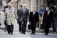 Former Penn State president Graham Spanier, center, walks from the Dauphin County Courthouse in Harrisburg, Pa., Friday, March 24, 2017. Spanier was convicted Friday of hushing up suspected child sex abuse in 2001 by Jerry Sandusky, whose arrest a decade later blew up into a major scandal for the university and led to the firing of beloved football coach Joe Paterno. (AP Photo/Matt Rourke)