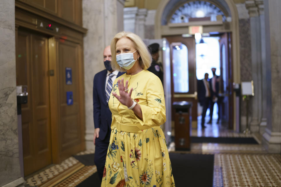 Cindy McCain, the widow of the late Senator John McCain of Arizona, arrives as Sen. Mark Kelly, D-Ariz., prepares to deliver his maiden speech to the Senate, at the Capitol in Washington, Wednesday, Aug. 4, 2021. (AP Photo/J. Scott Applewhite)