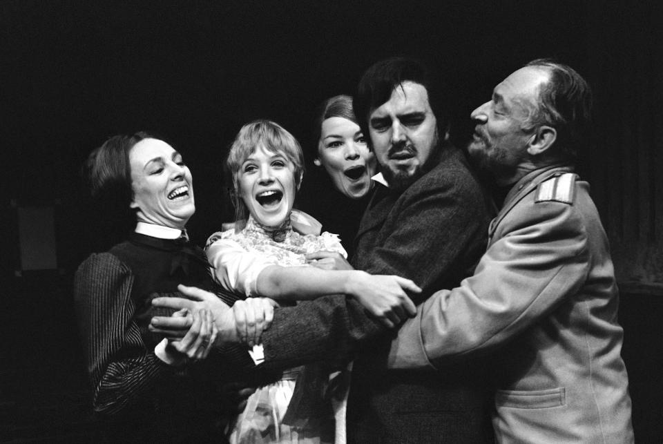 FILE - The cast, from left, Avril Elgar, Marianne Faithfull, Glenda Jackson, George Cole and Alan Webb, rehearse a performance of Chekhov's play "Three Sisters", at the Royal Court Theatre, London, April 13, 1967. Glenda Jackson, a double Academy Award-winning performer who had a long second career as a British lawmaker, has died at 87. Jackson's agent Lionel Larner said she died Thursday, June 15, 2023 at her home in London after a short illness. (AP Photo/Frank Leonard Tewkesbury, File)