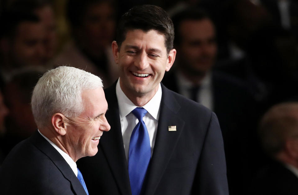 Vice President Mike Pence,left, and House Speaker Rep. Paul Ryan (R-WI) arrive to a joint session of the U.S. Congress with U.S. President Donald Trump on February 28, 2017 in the House chamber of the U.S. Capitol in Washington, DC.