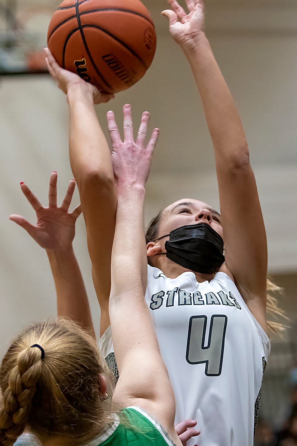 Galesburg High School sophomore Kiarra Kilgore shoots a short jump shot during the Silver Streaks' 51-46 overtime loss to Geneseo in WB6 Conference action on Thursday, Jan. 20, 2022 at John Thiel Gymnasium.