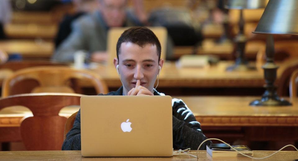 man using laptop