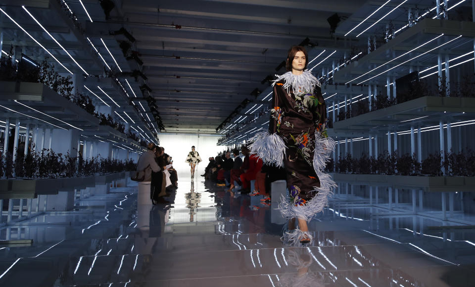 A model wears a creation as part of the Daniel Del Core women's and men's Fall Winter 2021-22 collection, unveiled during the Fashion Week in Milan, Italy, Wednesday, Feb. 24, 2021. (AP Photo/Antonio Calanni)