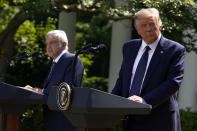 President Donald Trump listens as Mexican President Andres Manuel Lopez Obrador speaks during an event in the Rose Garden at the White House, Wednesday, July 8, 2020, in Washington. (AP Photo/Evan Vucci)