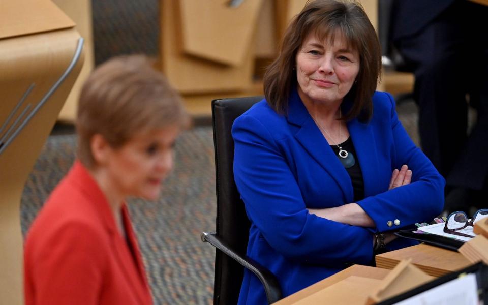 Jeane Freeman, right, confirmed the plan at Holyrood - JEFF J MITCHELL/AFP