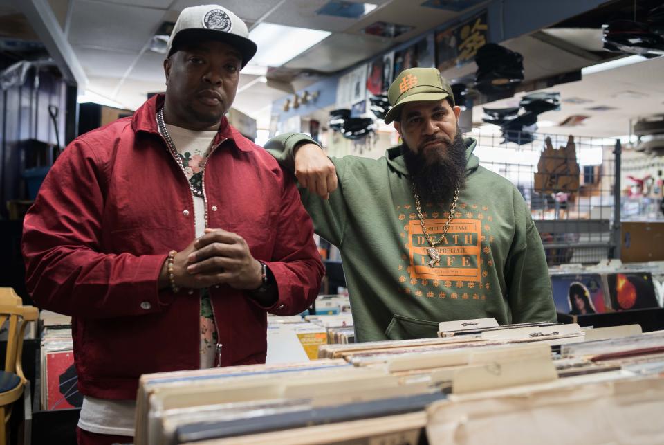 Newark native Chuck Creekmur (left) and Middletown resident Greg Watkins have interviewed countless rap artists over the last 25 years that they've run AllHipHop.com. They're hanging out at Wonderland Records in Newark on Thursday, April 20, 2023.