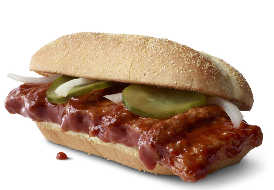 This photo provided by McDonald's shows the McRib sandwich. McDonald’s announced that it was bringing its barbeque slathered sandwich with the cult following back for yet another run on Dec. 2. The fast-food giant said the sandwich would be available nationally for the first time since 2012, but only at participating restaurants for a limited time. (McDonald's via AP)