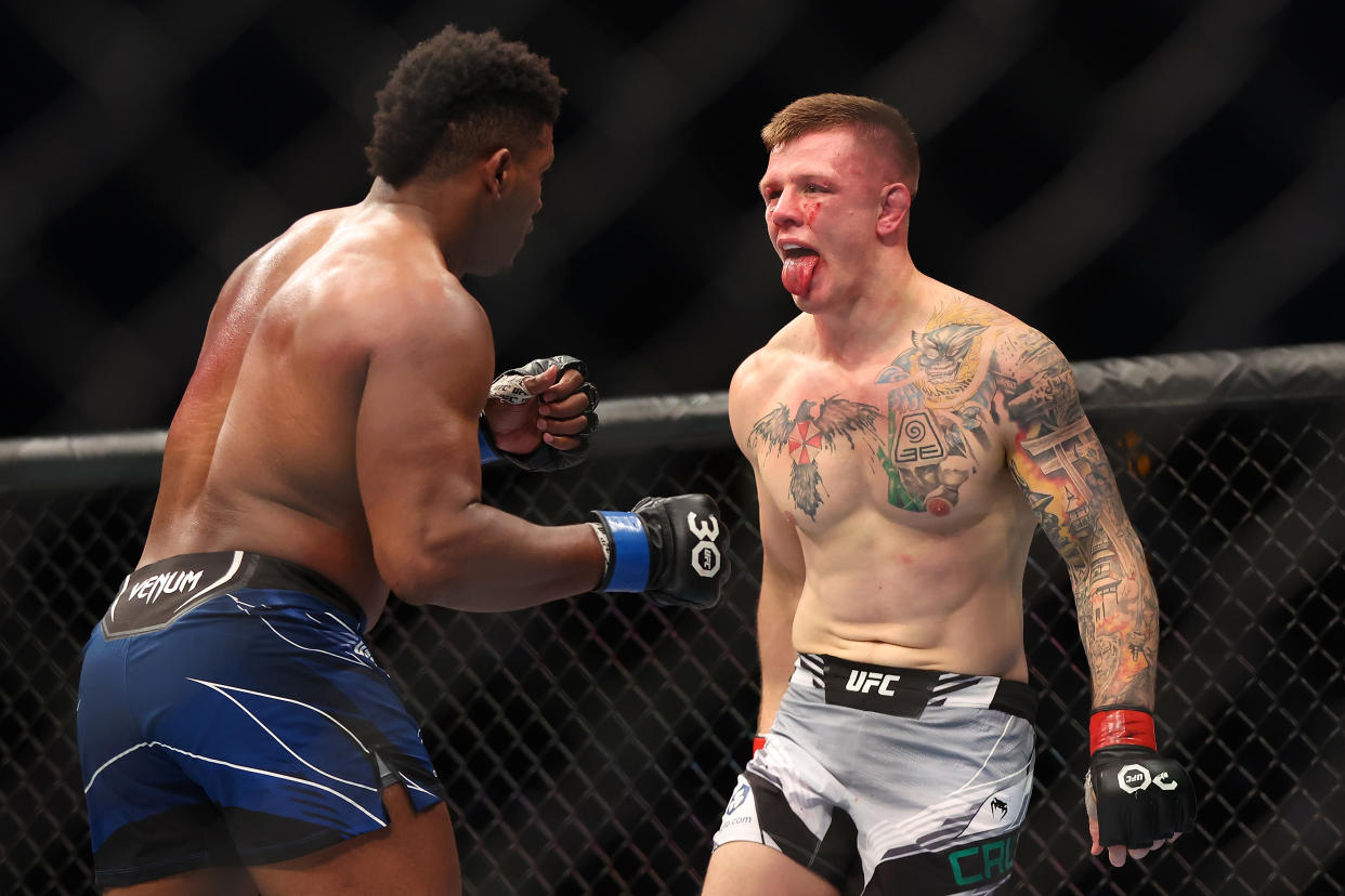 PERTH, AUSTRALIA - FEBRUARY 12: Jimmy Crute of Australia taunts Alonzo Menifield of the United States in a light heavyweight fight during UFC 284 at RAC Arena on February 12, 2023 in Perth, Australia. (Photo by Paul Kane/Getty Images)