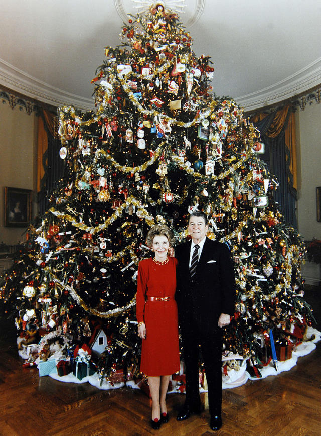 Christmas trees and garland in the Grand Foyer as the 2022 White House  Christmas decorations are