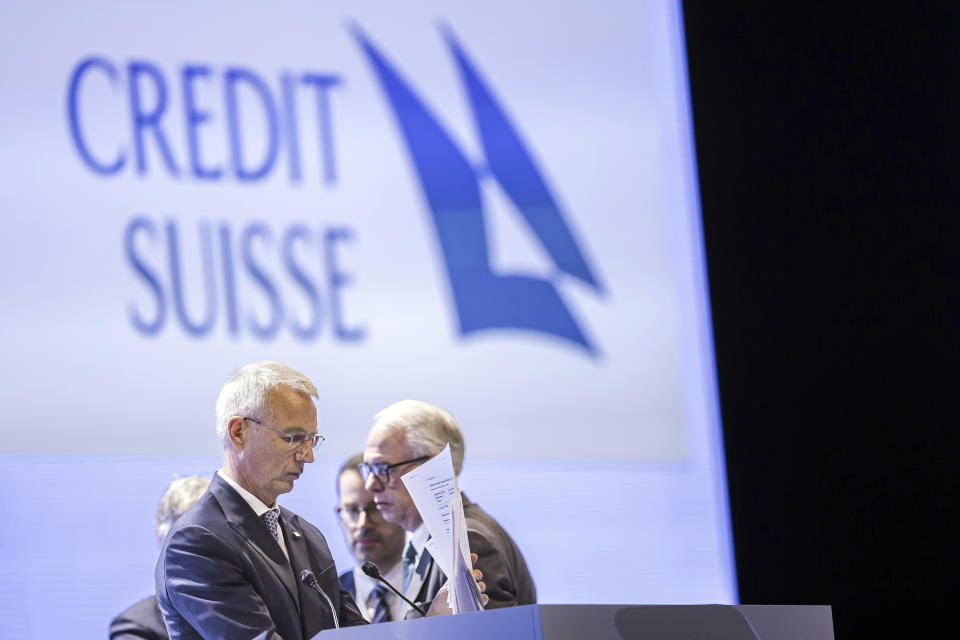 Swiss bank Credit Suisse Chairman Axel P. Lehmann, left, and CEO Ulrich Koerner, right, at the end of the annual shareholders' meeting of the Swiss banking group Tuesday, April 4, 2023 in Zurich, Switzerland. The chairman of Credit Suisse has apologized to shareholders for failures and acknowledged the shock and anger felt as the 167-year-old Swiss bank is set to be swallowed up by rival UBS in a government-arranged takeover.(Michael Buholzer/Keystone via AP)