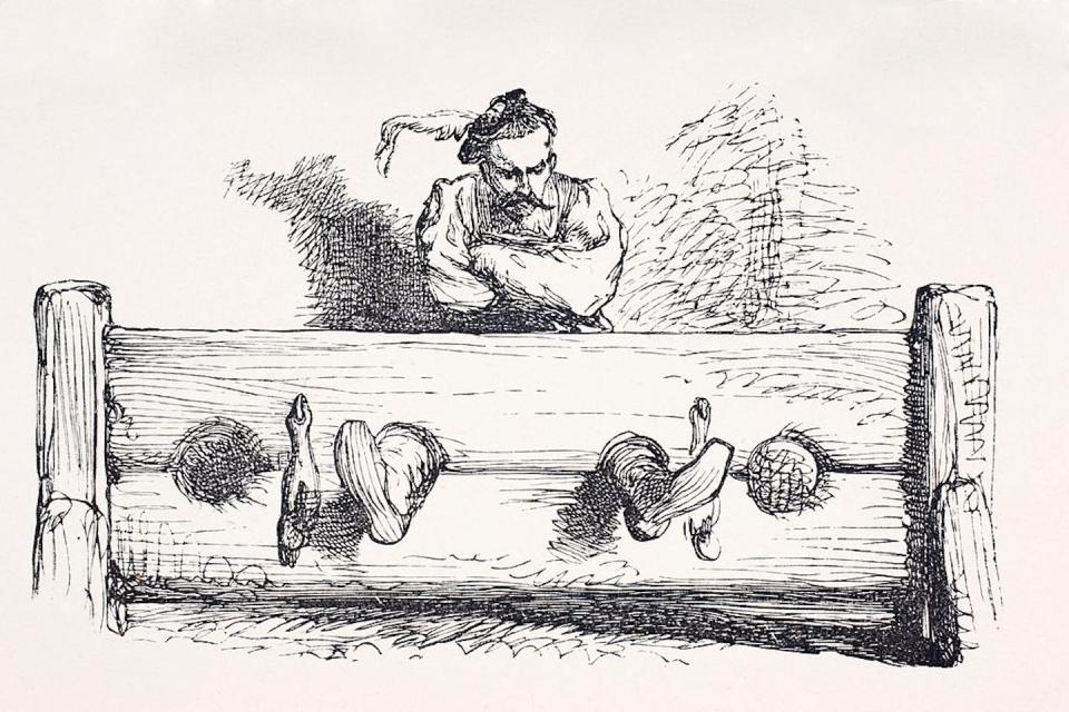 Stocks were an old-fashioned form of punishment where someone had to sit with their legs sticking through the holes for a while. <a href="https://www.gettyimages.com/detail/news-photo/man-in-stocks-from-the-illustrated-library-shakspeare-news-photo/188005368?phrase=stocks%20punishment&adppopup=true" rel="nofollow noopener" target="_blank" data-ylk="slk:Universal History Archive/Universal Images Group via Getty Images;elm:context_link;itc:0;sec:content-canvas" class="link ">Universal History Archive/Universal Images Group via Getty Images</a>