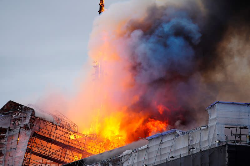 Smoke billows during a fire at the Old Stock Exchange, Boersen, in Copenhagen