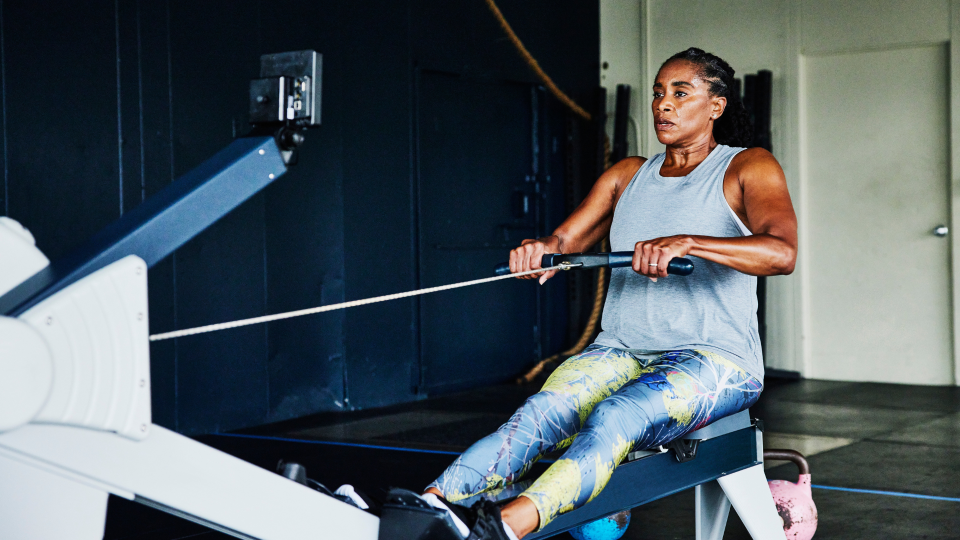 Woman on rowing machine