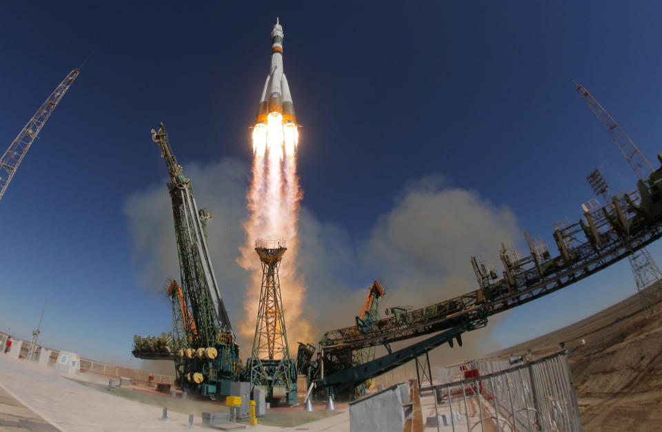 FILE - In this Thursday, Oct. 11, 2018 file photo, the Soyuz-FG rocket booster with Soyuz MS-10 space ship carrying a new crew to the International Space Station, ISS, blasts off at the Russian leased Baikonur cosmodrome, Kazakhstan. A Russian Soyuz rocket has put a cargo ship en route to the International Space Station, clearing the way for the next crewed mission. The launch on Friday, Nov. 16 of the Progress MS-10 resupply ship from Baikonur in Kazakhstan marked the fourth successful liftoff of a Soyuz since an crew launch last month. A Soyuz-FG rocket carrying NASA astronaut Nick Hague and Roscosmos' Alexei Ovchinin failed two minutes into its flight on Oct. 11. (AP Photo/Dmitri Lovetsky, file)