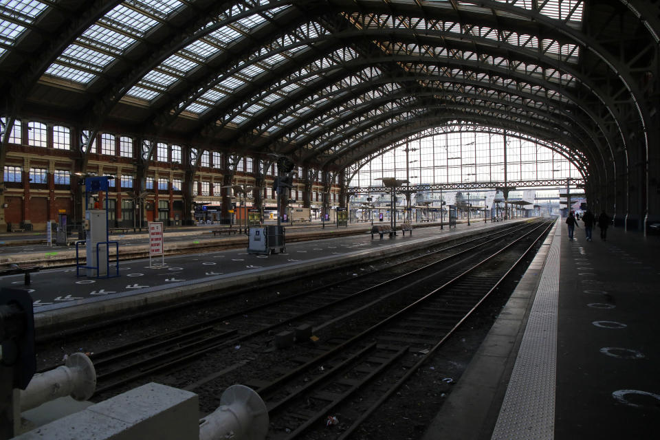 The deserted Lille train station is seen, northern France, Thursday, Jan. 19, 2023. Workers in many French cities took the streets Thursday to reject proposed pension changes that would push back the retirement age, amid a day of nationwide strikes and protests seen as a major test for Emmanuel Macron and his presidency. (AP Photo/Michel Spingler)