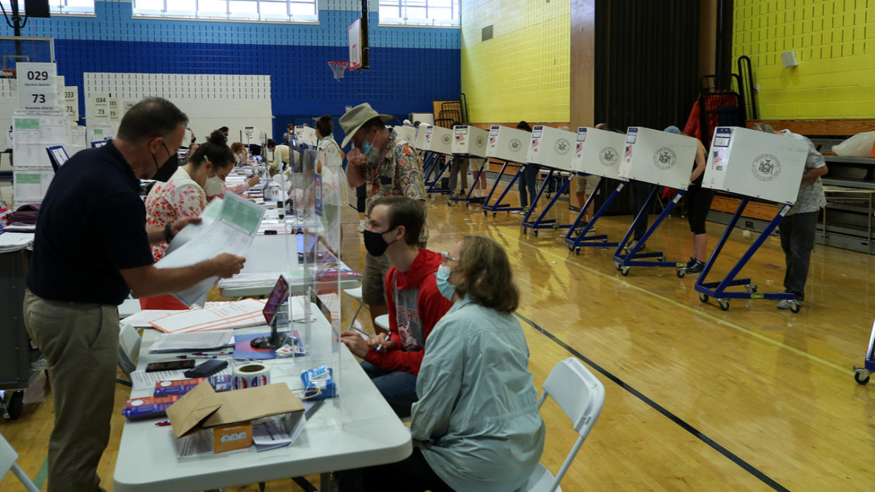 New Yorkers cast their votes in the mayoral primary election in New York on June 22, 2021. 