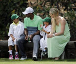 <p>Lindsey Vonn sits with Tiger Woods and his children Sam and Charlie during the Par 3 contest at the Masters golf tournament Wednesday, April 8, 2015, in Augusta, Ga. (AP Photo/David J. Phillip, File) </p>