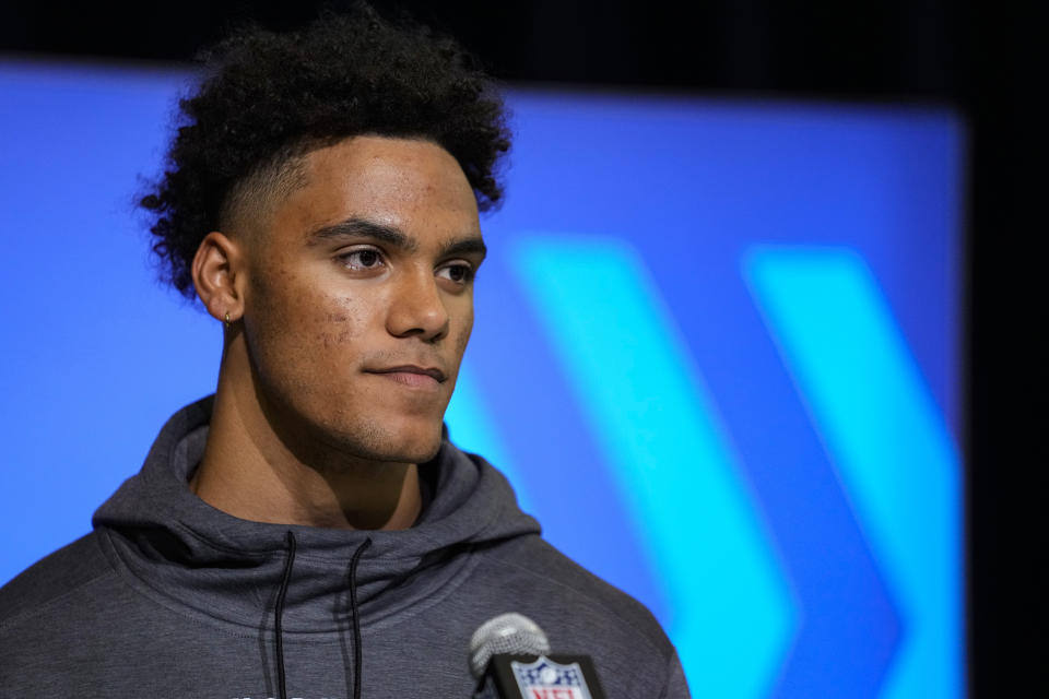 Oregon defensive back Christian Gonzalez speaks during a press conference at the NFL football scouting combine in Indianapolis, Thursday, March 2, 2023. (AP Photo/Michael Conroy)