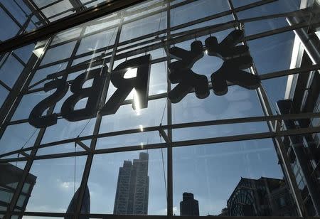 The City of London business district is seen through windows of the Royal Bank of Scotland (RBS) headquarters in London, Britain September 10, 2015. REUTERS/Toby Melville