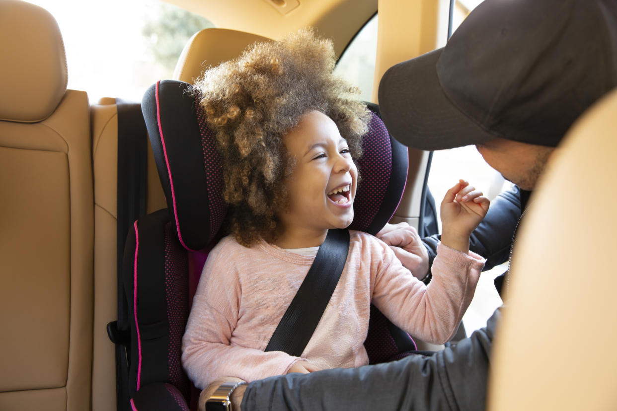 Kids and car seats can feel like an overwhelming topic for parents. Yahoo Life asked experts how moms and dads can be sure their child is ready to transition to a booster. (Photo: Getty Creative)