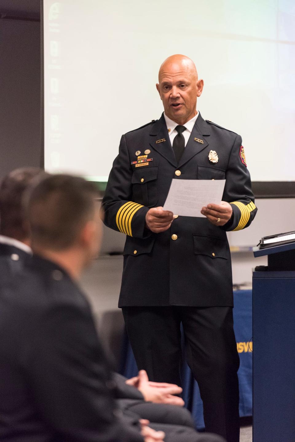 Former Evansville Fire Chief Mike Connelly in a 2018 ceremony.