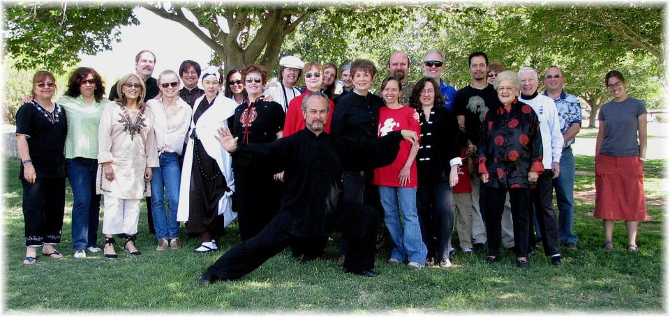 The Sacramento Chi Center For Healing Arts students photographed in some traditional Chinese garments alongside Tai Chi teacher Raymond Abeyta (center.)