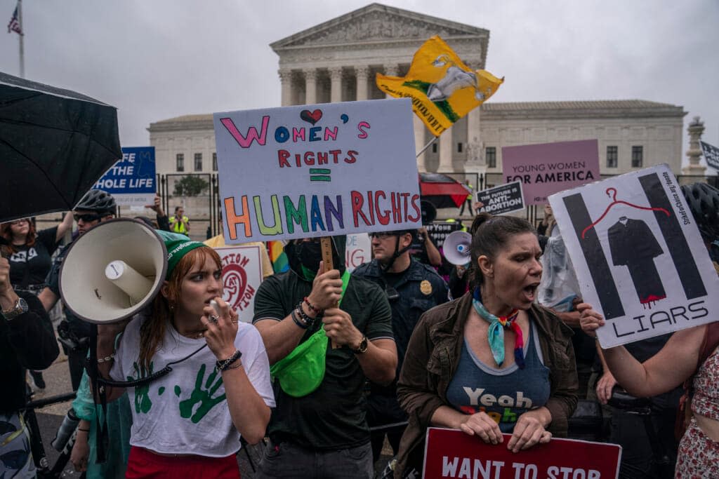 Abortion-rights activists chant during a rally in front of the Supreme Court on June 23, 2022 in Washington, DC. (Photo by Nathan Howard/Getty Images)