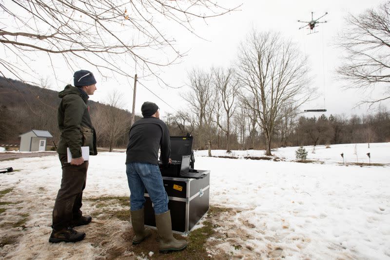 Alex Nikulin and Timothy De Smet fly a Ukrainian Multirotor Technologies (UMT) Cicada-M drone with a magnetometer to detect abandoned oil wells in Olean, New York
