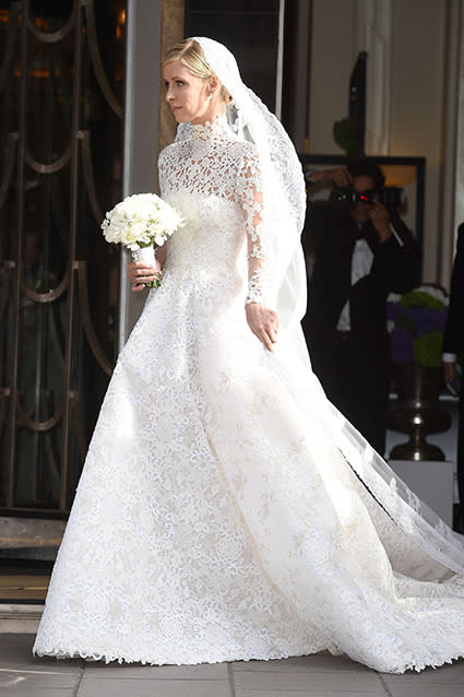 This has to be one of the best celebrity wedding dresses we've ever seen. Nicky Hilton looked gorgeous in a lacy, long-sleeved Valentino Couture wedding gown on Friday, as she stepped out of her London hotel headed to marry banking heir James Rothschild at Kensington Palace. FameFlynet <strong>PHOTOS: Beautiful Brides -- The Best Celebrity Wedding Dresses</strong> FameFlynet Check out the 31-year-old socialite's amazing train. FameFlynet Nicky had quite the hand in designing the gown as well. "Ever since I was a little girl I wanted Valentino to design my wedding dress. Valentino is the definition of timeless elegance, I don't think there's another couture house like it," she told Harper's Bazaar. <strong> WATCH: Nicky Hilton Marries James Rothschild in Lavish Ceremony </strong> "I went through every look from their collections over the last 10 years," she added. "I studied the archives, and I just sent notes about details I liked -- a certain sleeve, a high neckline." Valentino And the result -- six months later! -- is absolutely stunning: a custom couture gown with guipure lace, crystal embellishments, a balloon skirt and a nearly 10-foot train. The bride completed her look with a pair of white Christian Louboutins, inscribed with "Mrs. Rothschild." <strong>WATCH: Oops! Nicky Hilton Bares Her Butt in Serious Versace Wardrobe Malfunction</strong> Check out another memorable celebrity wedding dress -- Angelina Jolie's Versace gown when she married longtime love Brad Pitt last September -- in the video below.