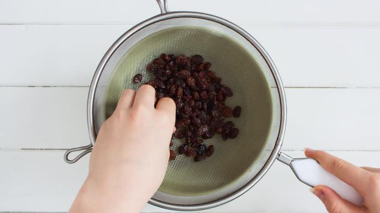 raisins in a sieve