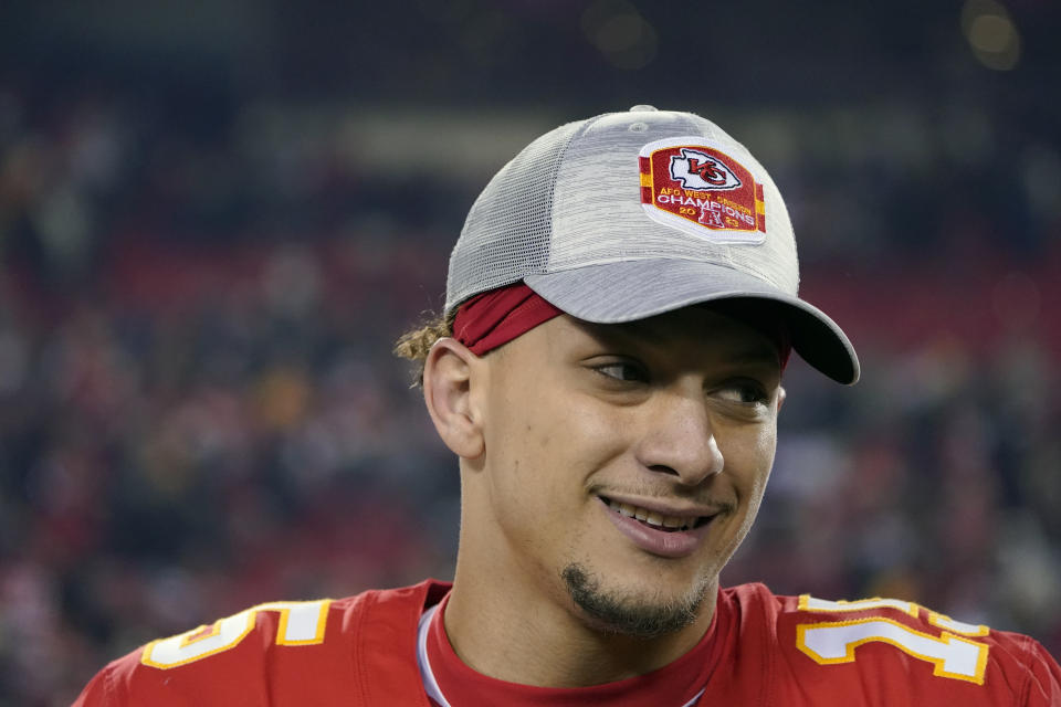 Kansas City Chiefs quarterback Patrick Mahomes celebrates following an NFL football game against the Cincinnati Bengals Sunday, Dec. 31, 2023, in Kansas City, Mo. The Chiefs won 25-17 to clinch the AFC West. (AP Photo/Ed Zurga)