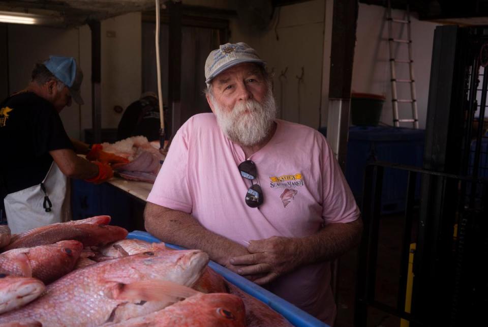 Buddy Guindon, a Galveston-based commercial fisherman and owner of Katie’s Seafood Market, watches over as his employees unload about 30,000 pounds of freshly caught red snapper from a five-day fishing trip in the Gulf of Mexico in Galveston on July 17, 2023.