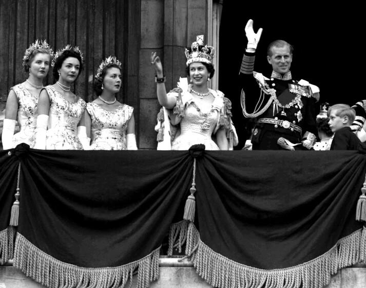 Britain's Queen Elizabeth II and Prince Philip, Duke of Edinburgh, gather with other members of the British royal family