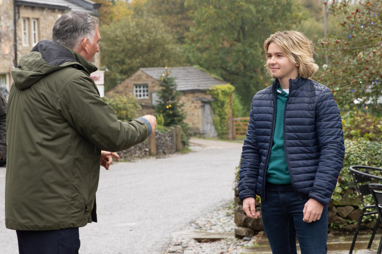  Bob presses Heath for gossip in Emmerdale . 