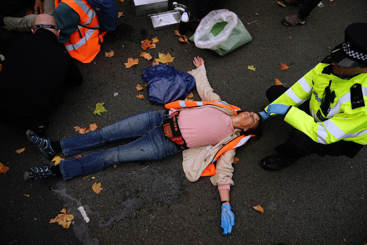 Activists from Just Stop Oil during their protest on Cromwell Road, London, near to the Victoria & Albert Museum. Picture date: Wednesday October 19, 2022.