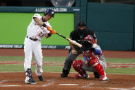American League's Michael Brantley, of the Houston Astros, hits an RBI double during the second inning of the MLB baseball All-Star Game against the National League, Tuesday, July 9, 2019, in Cleveland. (AP Photo/Ron Schwane)