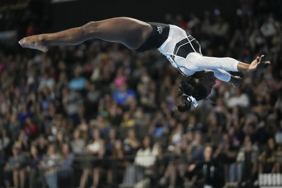 Simone Biles performs in the floor exercise at the U.S. Classic gymnastics competition Saturday, Aug. 5, 2023, in Hoffman Estates, Ill. (AP Photo/Erin Hooley)