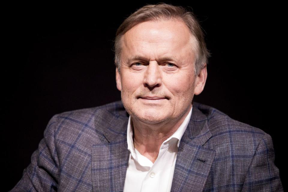 <p>John Grisham was born in Jonesboro Arkansas, and dreamed of being a pro baseball player. He left those dreams behind to practice law after college, and was even elected to the State house of Representatives in 1983, where he served for 7 years. After overhearing a gruesome testimony from a rape victim, Grisham was inspired to write a novel exploring a what if scenarios, resulting in the best-selling <em>A Time To Kill</em>. Surprisingly, there wasn’t much interest in the story until he sold his second novel––<em>The Firm</em>––and the film rights to it. After two more bestsellers, there was renewed interest in his first, which was reprinted and became a bestseller and a blockbuster hit. </p>