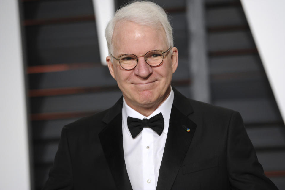 FILE - Steve Martin arrives at the 2015 Vanity Fair Oscar Party on Sunday, Feb. 22, 2015, in Beverly Hills, Calif. Martin is the subject of a new documentary "Steve! (Martin) a Documentary in 2 Pieces." (Photo by Evan Agostini/Invision/AP, File)