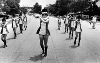 <p>Frances Fowler leads the Bowie VFD Marching Thoroughbreds in the Bowie Fourth of July parade in Bowie, Md., 1976. (Photo: James M. Thresher/Washington Post via Getty Images) </p>