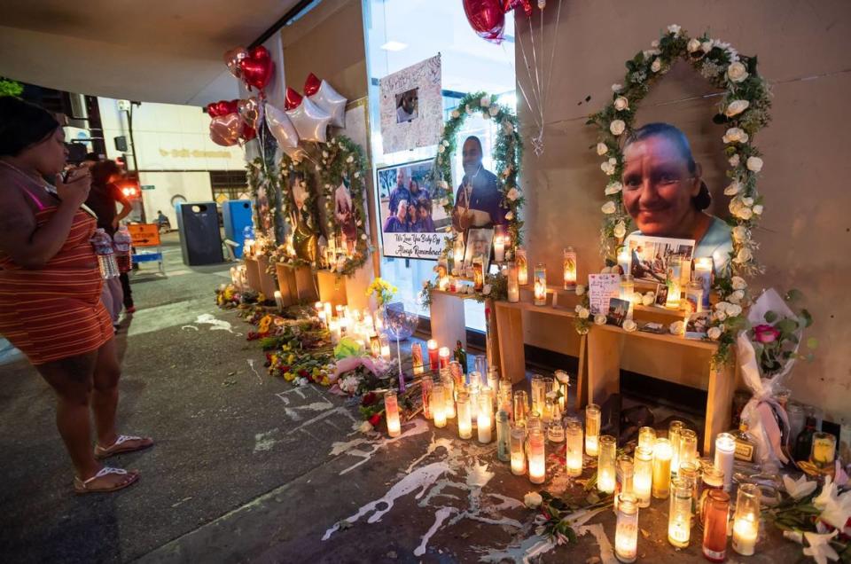 A photo of Melinda Davis, right, joins pictures of other victims on April 6, at a memorial at 10th and K streets for the victims of the shooting on April 3 that left six people dead in downtown Sacramento. Davis, who was homeless, was caught in the crossfire.