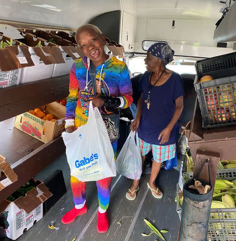 <p>Courtesy Lydia Taylor </p> Battle makes weekly drop-offs at housing units around Knoxville in his “veggie van.” “We’re meeting a need,” he says.