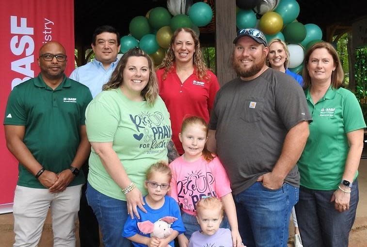 Family and friends from BASF sites in the Upstate help Ruthie Gregory celebrate her birthday.