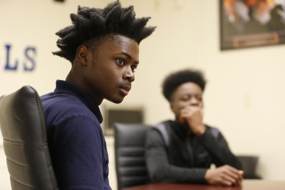 Larry Anderson, left, and Kamal Ani-Bello, both Miami Northwestern Senior High School students who acted in the movie "Moonlight," speak during an interview, Monday, Feb. 27, 2017, in Miami. The film garnered three Oscars Sunday night, including the award for best picture. (AP Photo/Wilfredo Lee)