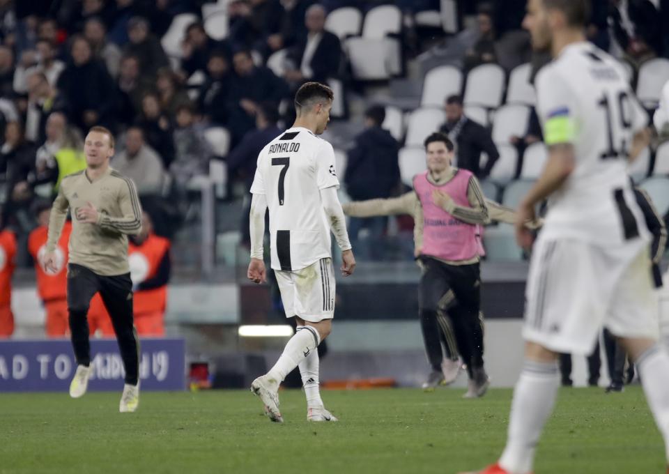 Juventus' Cristiano Ronaldo walks off the pitch at the end of the Champions League, quarterfinal, second leg soccer match between Juventus and Ajax, at the Allianz stadium in Turin, Italy, Tuesday, April 16, 2019. Ajax won 2-1 and advances to the semifinals on a 3-2 aggregate. (AP Photo/Luca Bruno)