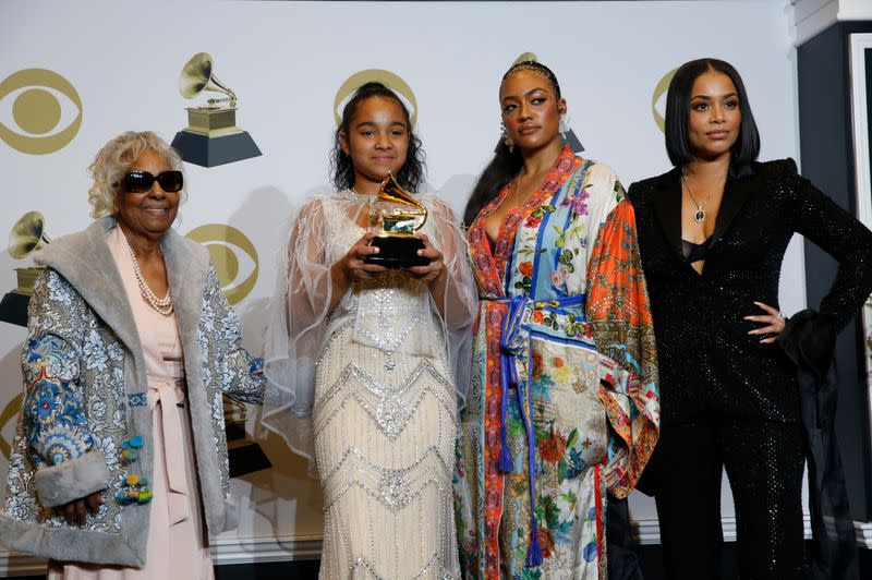 62nd Grammy Awards – Photo Room – Los Angeles, California, U.S., January 26, 2020 - (L-R) Nipsey Hussle's family, grandmother Margaret Bouffe, daughter Emani Asghedom, sister Samantha Smith and wife Lauren London pose