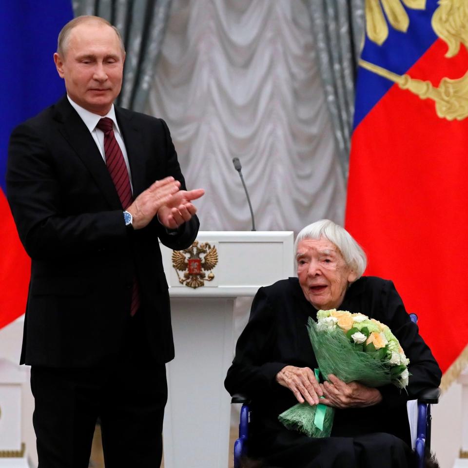 Vladimir Putin presents Lyudmila Alexeyeva with an award in 2017 - Yuri Kochetkov/AP